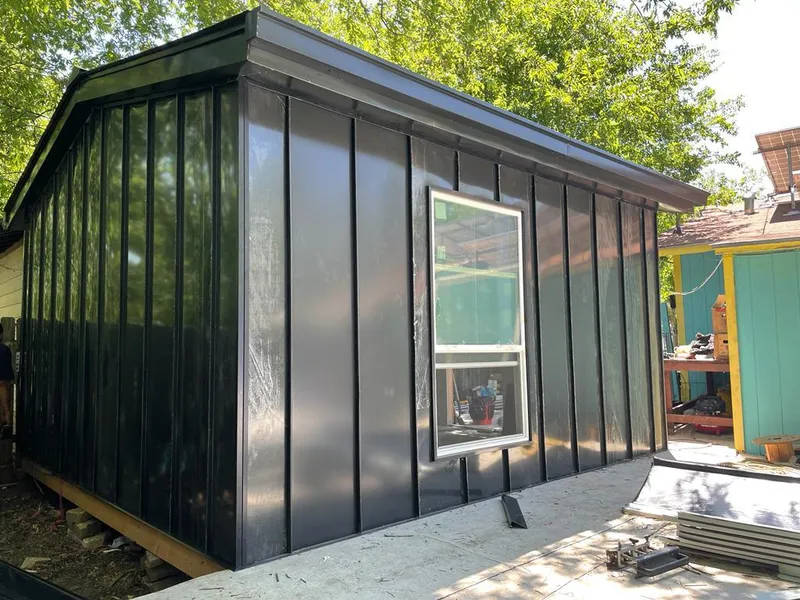 Black standing seam metal wall panels for Metal Roof Installation in Fellsmere