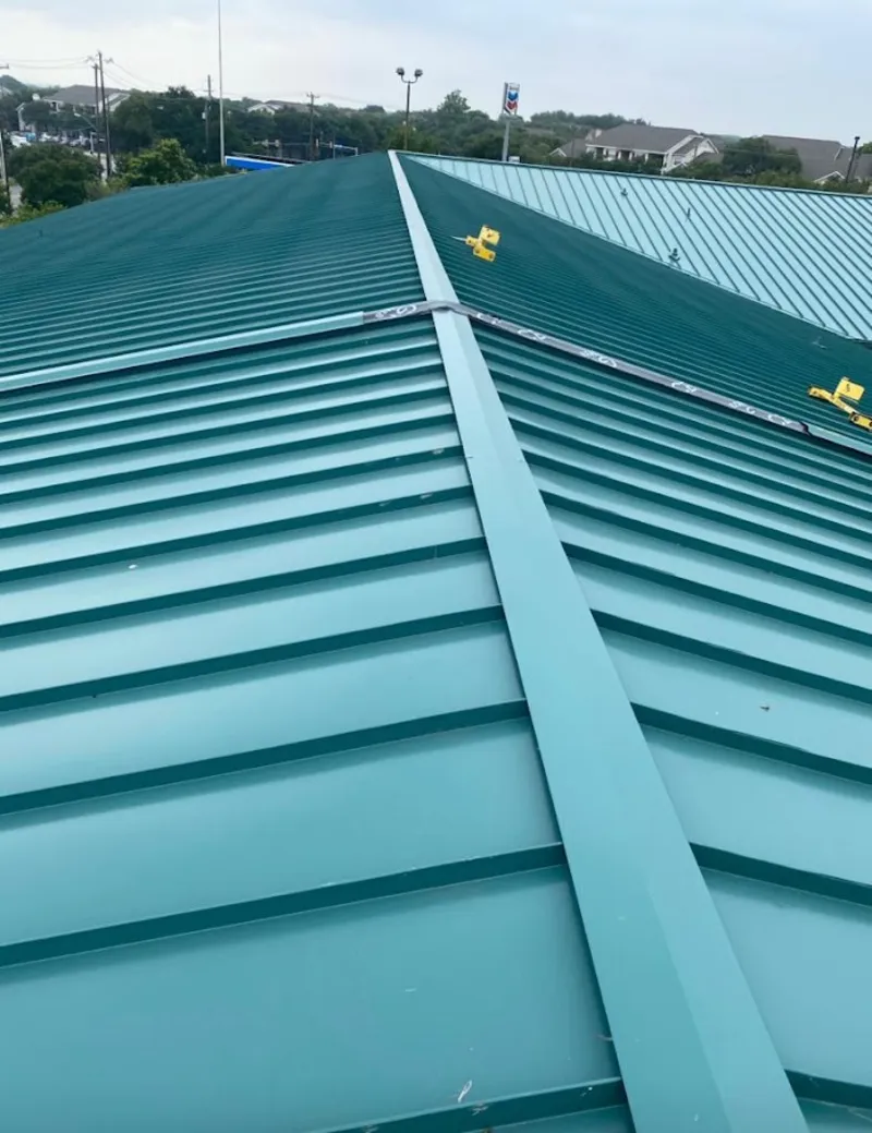 Green commercial metal roof ridge and valley for Metal Roof Repair in Fellsmere